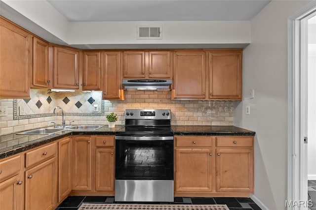 404 Applestone Dr, Ballwin, MO 63021 - kitchen featuring stainless steel electric stove, under cabinet range hood, decorative backsplash, and dark tile patterned floors