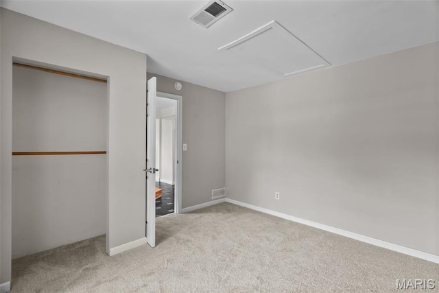 404 Applestone Dr, Ballwin, MO 63021 - unfurnished bedroom with carpet, attic access, and a closet