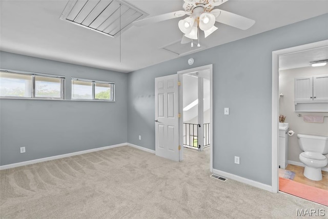 404 Applestone Dr, Ballwin, MO 63021 - unfurnished bedroom with attic access, carpet flooring, ensuite bathroom, and ceiling fan