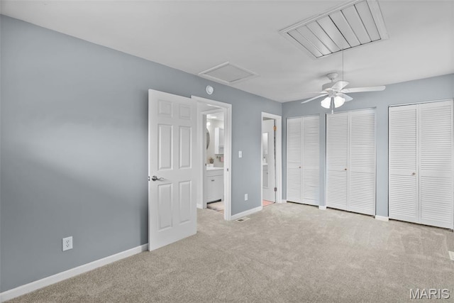 404 Applestone Dr, Ballwin, MO 63021 - unfurnished bedroom with multiple closets, carpet, attic access, ensuite bath, and a ceiling fan