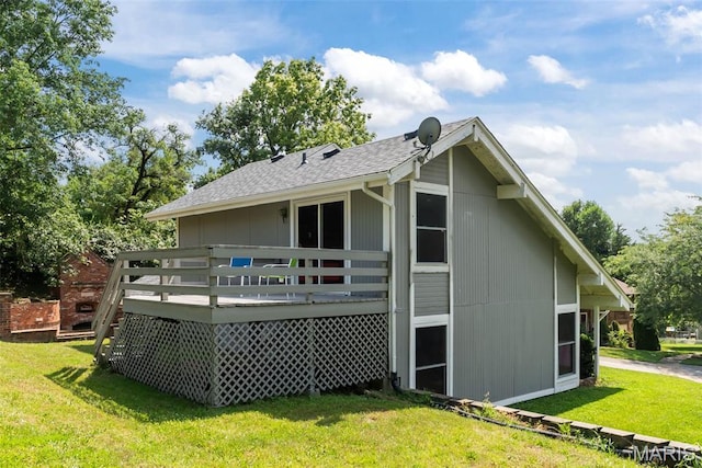 404 Applestone Dr, Ballwin, MO 63021 - rear view of house with a wooden deck, a yard, and a shingled roof