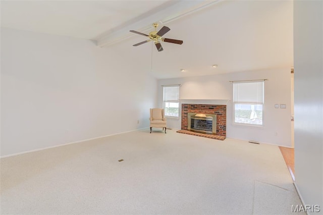 1733 Forest Trace Dr, Ofallon, MO 63368 - unfurnished living room with carpet, a ceiling fan, and a fireplace