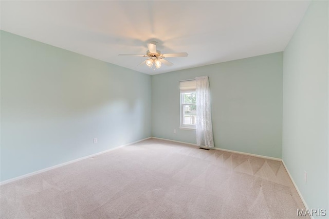 1733 Forest Trace Dr, Ofallon, MO 63368 - empty room with light colored carpet and a ceiling fan
