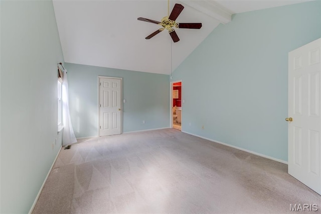 1733 Forest Trace Dr, Ofallon, MO 63368 - empty room featuring a ceiling fan, high vaulted ceiling, carpet floors, and beam ceiling