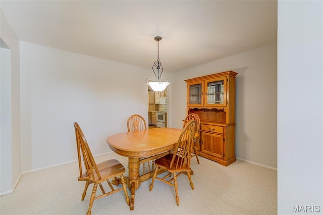 1733 Forest Trace Dr, Ofallon, MO 63368 - dining room featuring light carpet and baseboards
