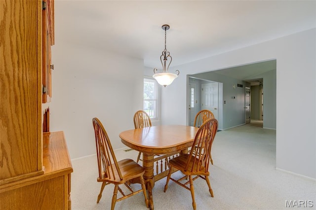 1733 Forest Trace Dr, Ofallon, MO 63368 - dining room with light colored carpet and baseboards