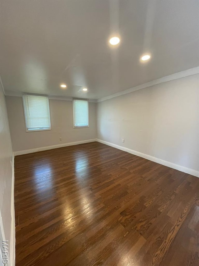 5350 Claxton Ave, Saint Louis, MO 63120 - unfurnished room featuring ornamental molding, dark wood-type flooring, and recessed lighting