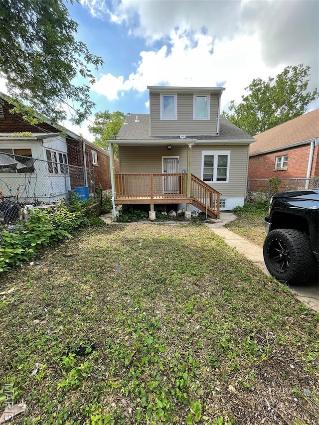 5350 Claxton Ave, Saint Louis, MO 63120 - rear view of house featuring a deck