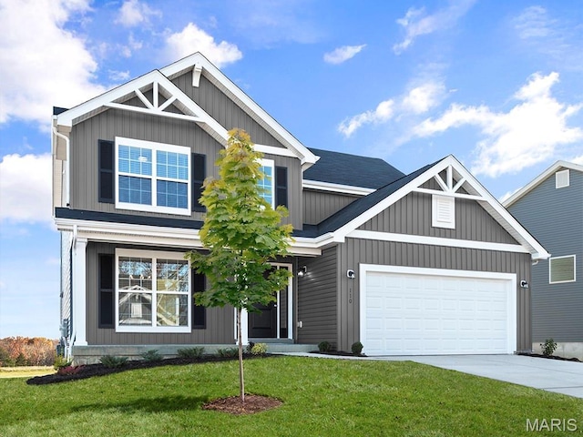807 Colony Ridge Ct, Foristell, MO 63348 - craftsman-style home with driveway, an attached garage, and a front lawn