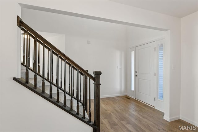 807 Colony Ridge Ct, Foristell, MO 63348 - foyer with wood finished floors and stairs