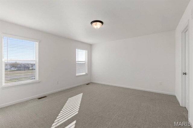 807 Colony Ridge Ct, Foristell, MO 63348 - spare room with light carpet and baseboards