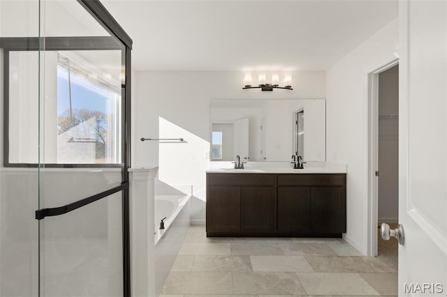 807 Colony Ridge Ct, Foristell, MO 63348 - full bathroom featuring double vanity, a bath, and a spacious closet