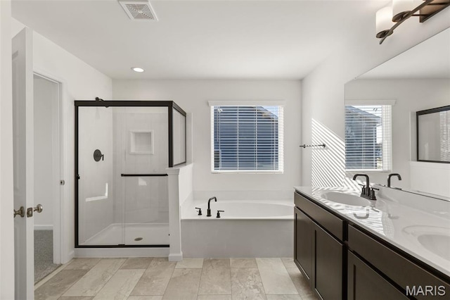 807 Colony Ridge Ct, Foristell, MO 63348 - bathroom with a garden tub, a stall shower, and double vanity