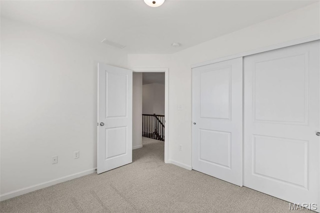 807 Colony Ridge Ct, Foristell, MO 63348 - unfurnished bedroom featuring light carpet and a closet