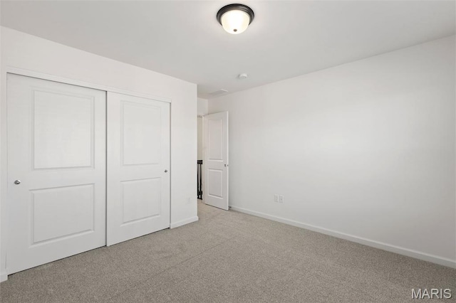 807 Colony Ridge Ct, Foristell, MO 63348 - unfurnished bedroom with light carpet and a closet