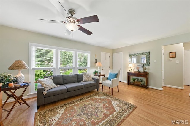 7142 Circleview Dr, Gravois Township, MO 63123 - living area featuring ceiling fan and light wood-style flooring