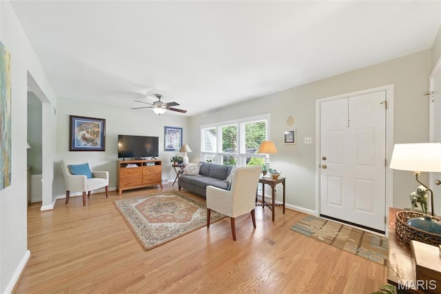 7142 Circleview Dr, Gravois Township, MO 63123 - living room with light wood-style floors and ceiling fan