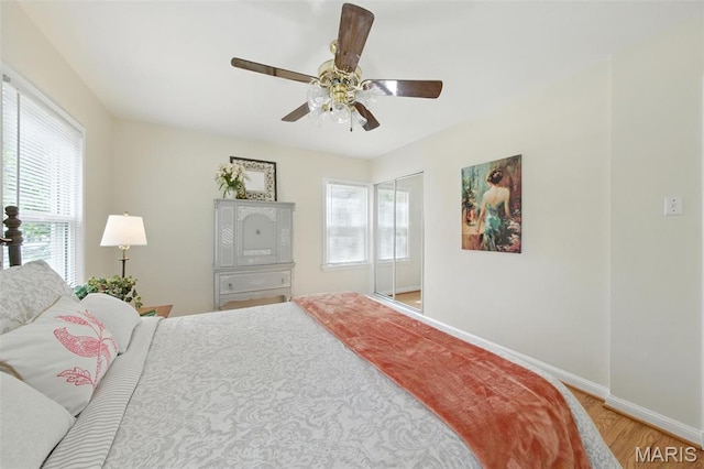 7142 Circleview Dr, Gravois Township, MO 63123 - bedroom with light wood-style floors and a ceiling fan