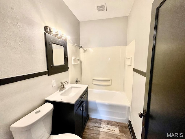 1519 Lebanon Ave, Belleville, IL 62221 - full bathroom featuring vanity, wood finished floors, and bathtub / shower combination