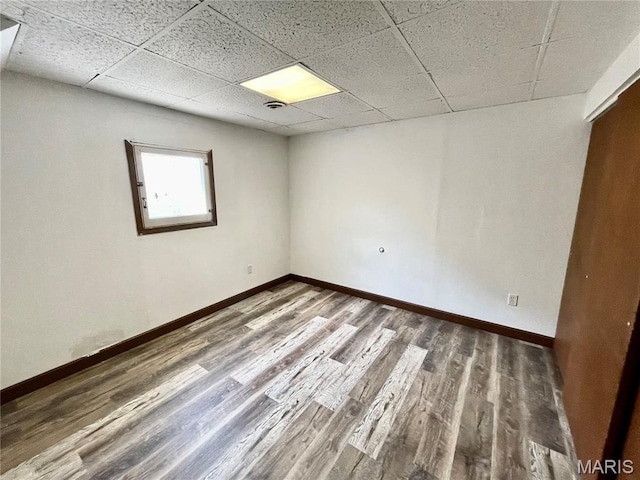 1519 Lebanon Ave, Belleville, IL 62221 - unfurnished room featuring wood finished floors and a drop ceiling