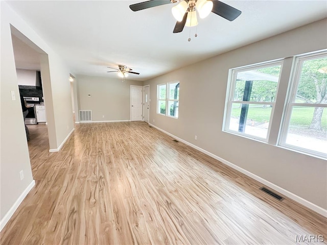 66 County Road 6680, Salem, MO 65560 - unfurnished living room with light wood-style floors and a ceiling fan