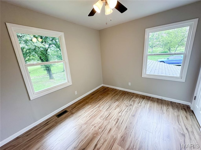 66 County Road 6680, Salem, MO 65560 - empty room with wood finished floors and a ceiling fan
