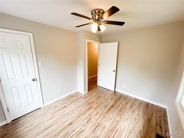 66 County Road 6680, Salem, MO 65560 - unfurnished bedroom with light wood-type flooring and ceiling fan