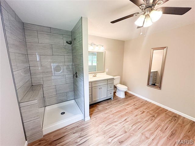 66 County Road 6680, Salem, MO 65560 - full bathroom featuring tiled shower, vanity, a ceiling fan, and wood finished floors