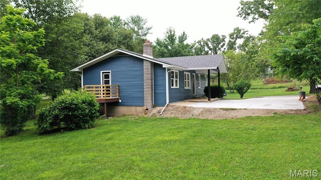 66 County Road 6680, Salem, MO 65560 - view of property exterior with a chimney and a yard