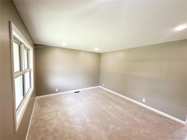 6484 County Road 3180, Salem, MO 65560 - spare room featuring light colored carpet and baseboards