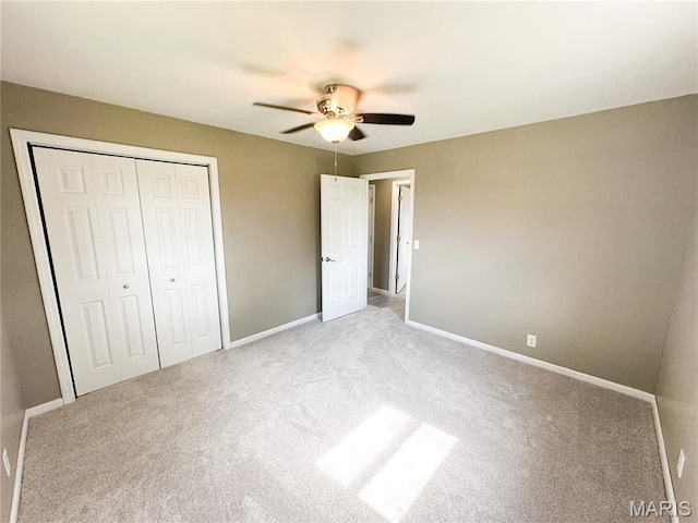 6484 County Road 3180, Salem, MO 65560 - unfurnished bedroom with a closet, carpet flooring, and a ceiling fan