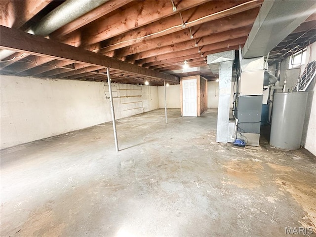 6484 County Road 3180, Salem, MO 65560 - unfinished below grade area with water heater and heating unit
