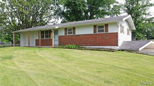 6484 County Road 3180, Salem, MO 65560 - ranch-style house featuring brick siding, a front lawn, and a garage