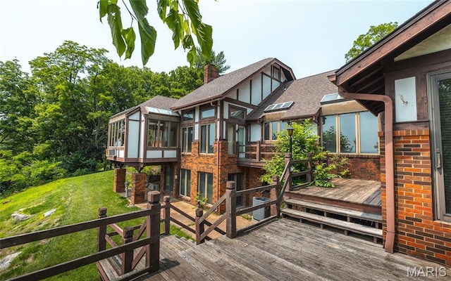 3401 Riverview Ct, Godfrey, IL 62035 - wooden terrace featuring a sunroom and a yard