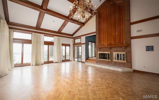3401 Riverview Ct, Godfrey, IL 62035 - unfurnished living room featuring high vaulted ceiling, healthy amount of natural light, a chandelier, a brick fireplace, and beam ceiling