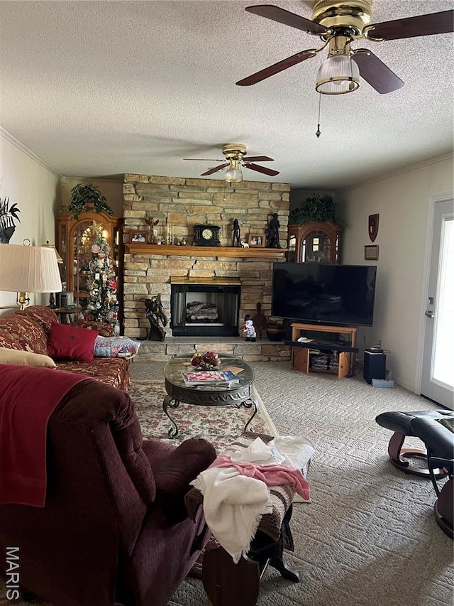 6969 US Highway 61, Jackson, MO 63755 - living area with ornamental molding, carpet floors, a ceiling fan, a textured ceiling, and a fireplace
