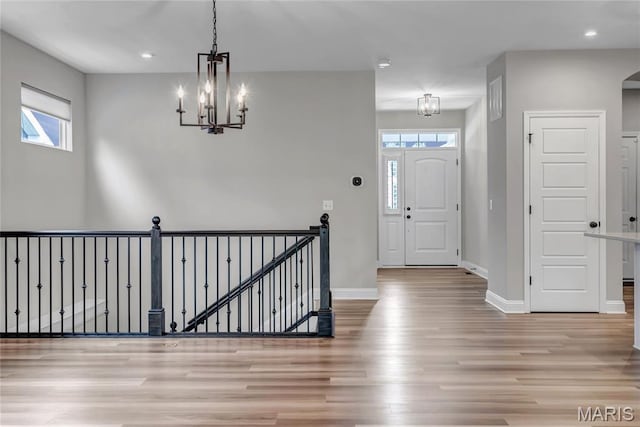 211 Cambium Ct, Wentzville, MO 63385 - entryway with wood finished floors, a chandelier, and recessed lighting
