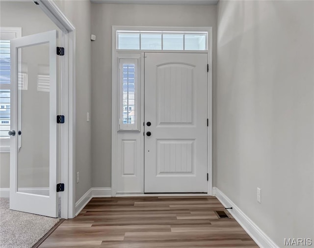 211 Cambium Ct, Wentzville, MO 63385 - entrance foyer featuring healthy amount of natural light and light wood finished floors