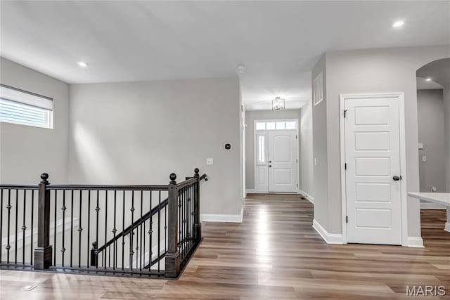211 Cambium Ct, Wentzville, MO 63385 - foyer featuring wood finished floors, arched walkways, and recessed lighting