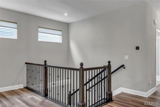 211 Cambium Ct, Wentzville, MO 63385 - stairs featuring baseboards and wood finished floors