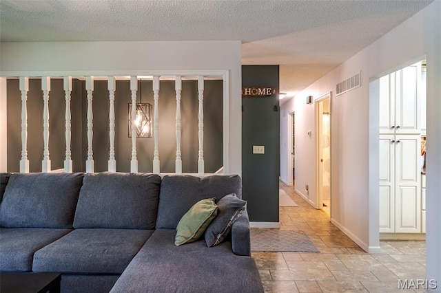 1003 Marilyn Ct, Washington, MO 63090 - living area featuring baseboards and light stone finish floors