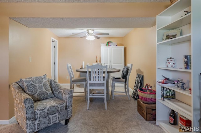 1003 Marilyn Ct, Washington, MO 63090 - carpeted dining area featuring a ceiling fan and baseboards