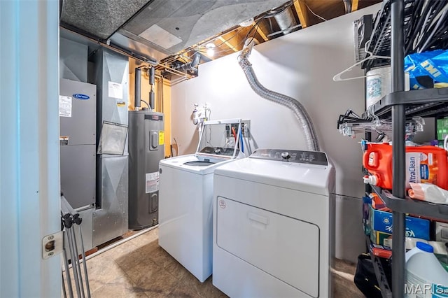 1003 Marilyn Ct, Washington, MO 63090 - washroom with electric water heater and independent washer and dryer