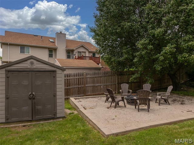 4 Green Circle Ct, Saint Peters, MO 63376 - view of patio / terrace with a storage shed and an outdoor fire pit