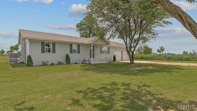 3120 State Highway F, Cardwell, MO 63829 - ranch-style house with an attached garage, brick siding, concrete driveway, and a front yard