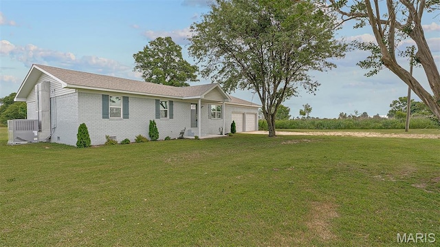 3120 State Highway F, Cardwell, MO 63829 - ranch-style home with a garage, brick siding, and a front yard