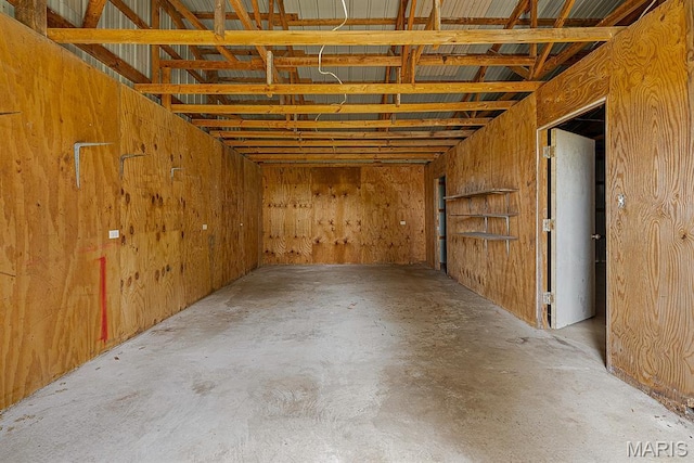 3120 State Highway F, Cardwell, MO 63829 - miscellaneous room featuring unfinished concrete flooring and wooden walls