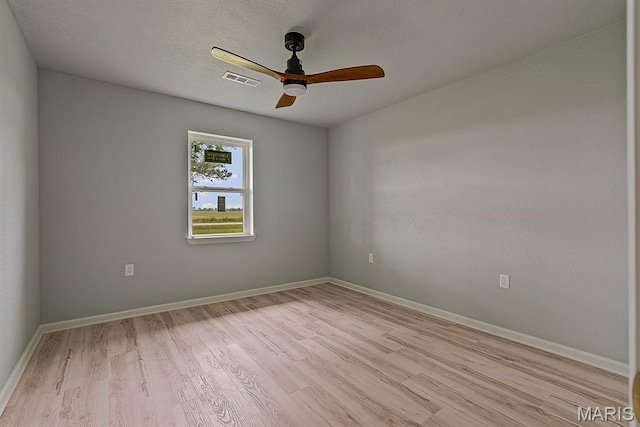 3120 State Highway F, Cardwell, MO 63829 - empty room with light wood-style floors and ceiling fan