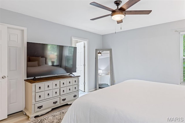 404 Arbor Spring Dr, Ballwin, MO 63021 - bedroom featuring light wood-style flooring and ceiling fan