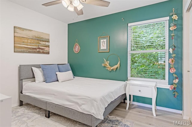 404 Arbor Spring Dr, Ballwin, MO 63021 - bedroom with wood finished floors and ceiling fan